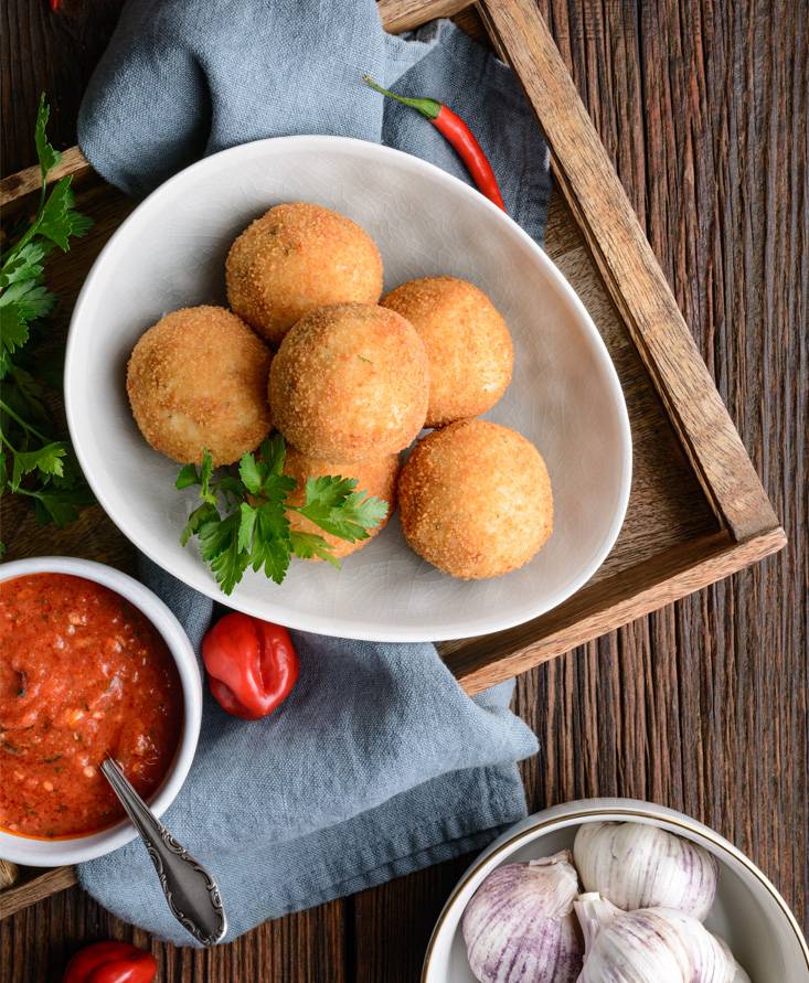 Arancini al pomodoro e origano