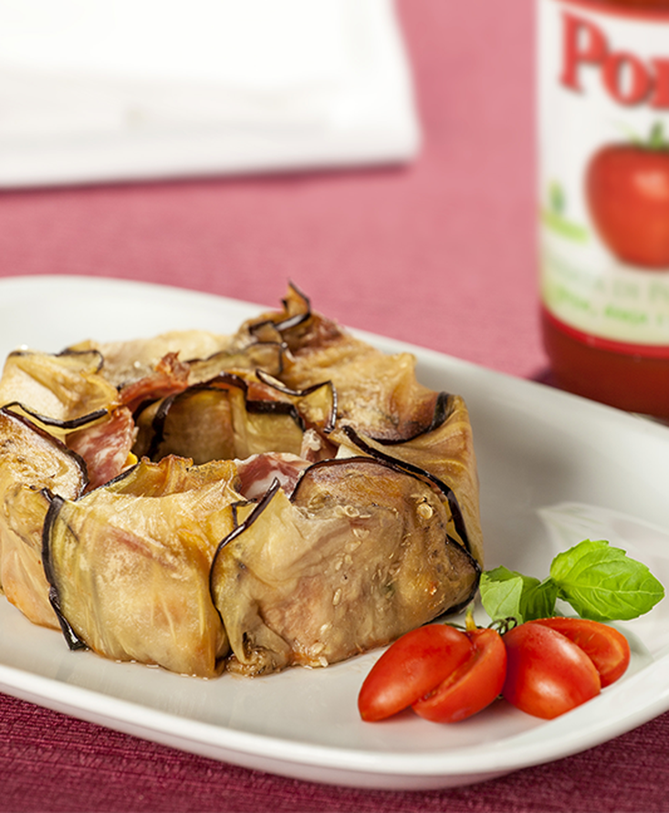 Ciambella di pecorare ripiene rivestite di melanzane al forno