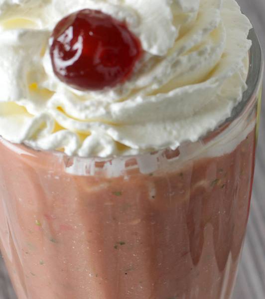 Tomato, banana, apple and lemon smoothie