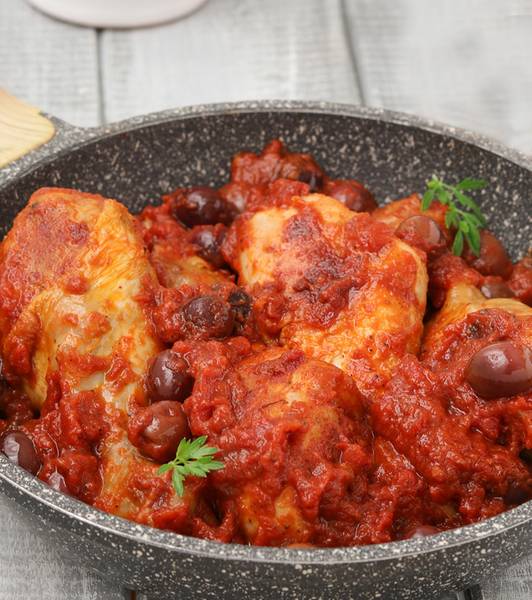 Fusi di pollo con pomodori e olive