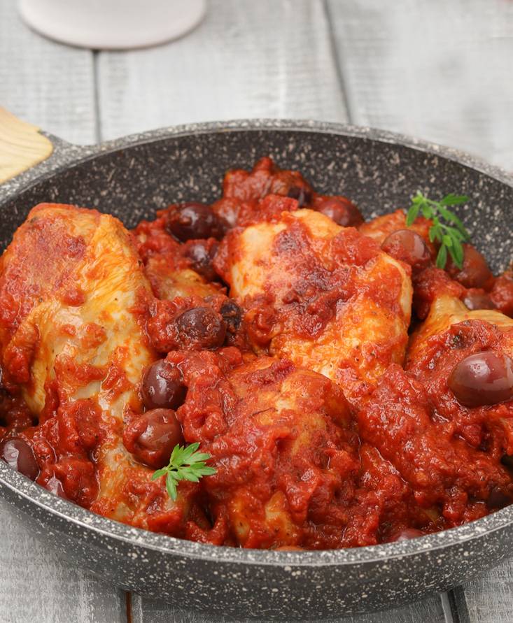 Fusi di pollo con pomodori e olive