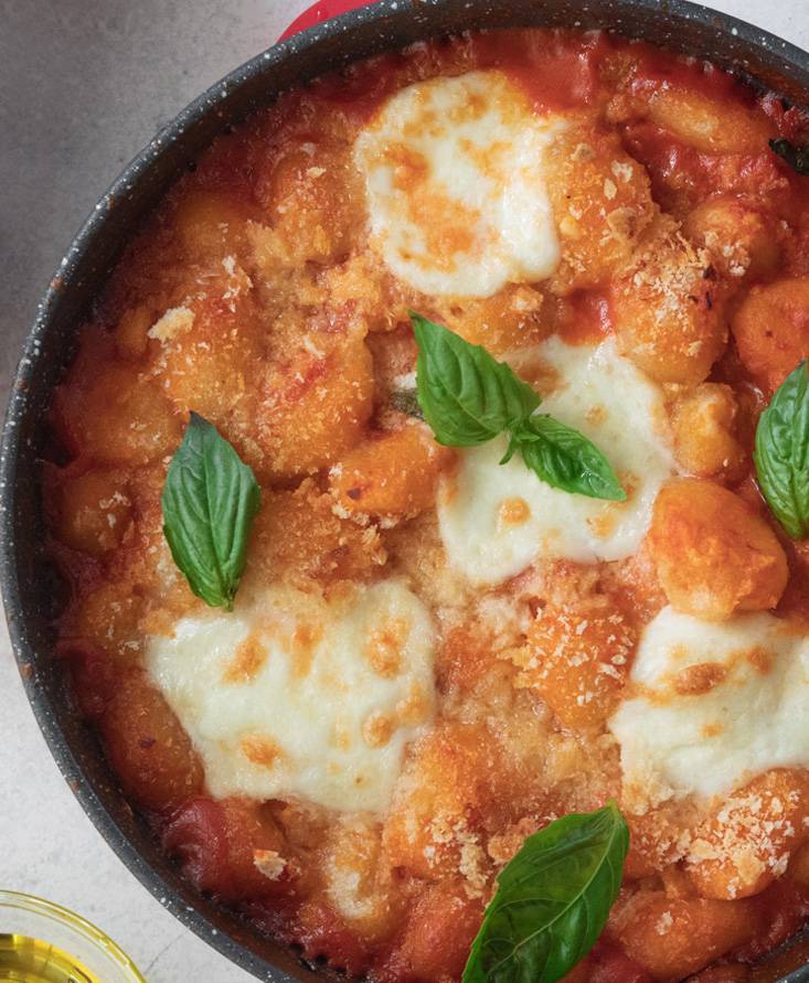 Ñoquis al horno con salsa cremosa de tomate Pomì