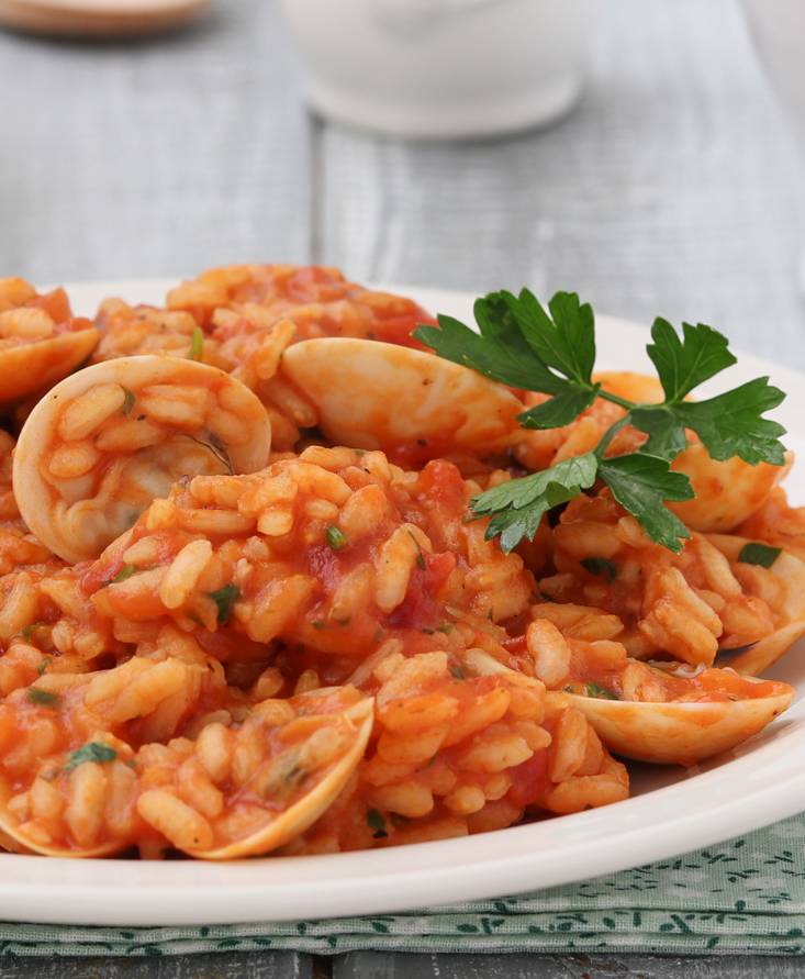 Risotto con vongole al pomodoro Elena Laudicina Pomi Italia