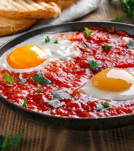 Яичница в томатном соусе